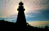 Lighthouse in silhouette